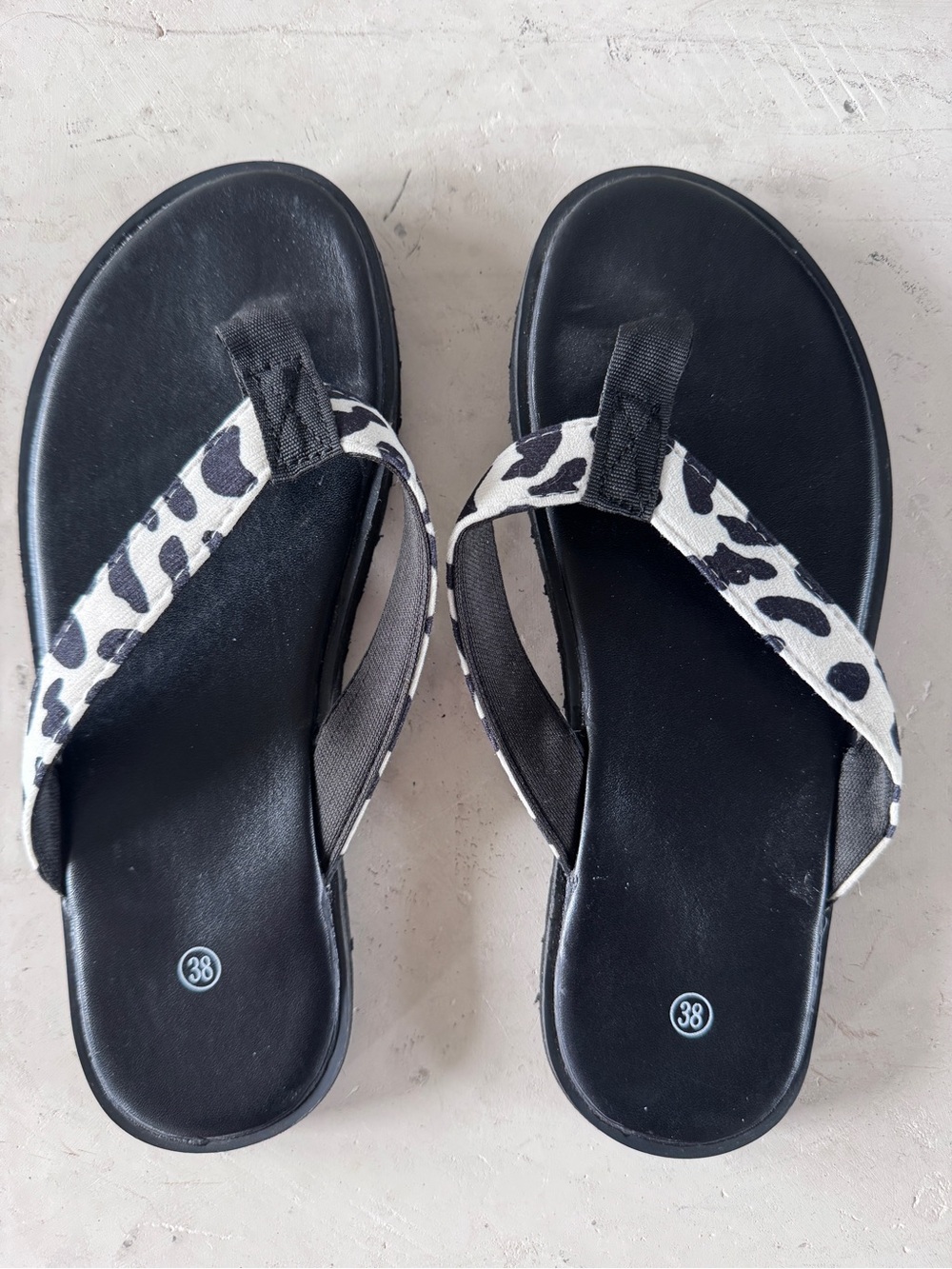 Never worn- Black Flip-Flop Sandals with Black & White Animal-Print Straps